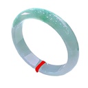 Un jade de jadeíta verde ceroso de hielo de carga